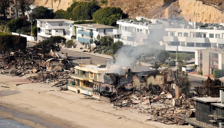 Arizona Firefighters Guard a Southern California Neighborhood That Has Been Damaged