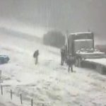 Florida Highway Patrol vehicle was helped out of the middle on I-10 during a snowstorm