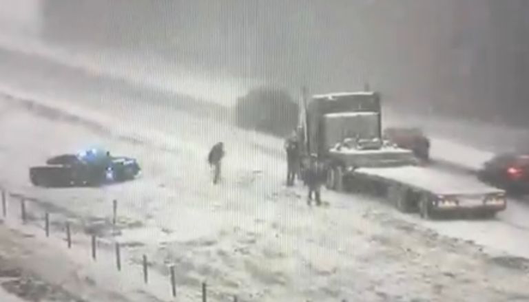 Florida Highway Patrol vehicle was helped out of the middle on I-10 during a snowstorm