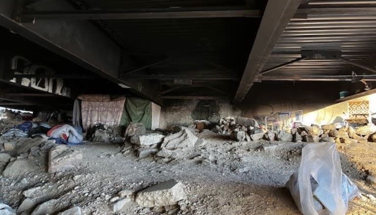 Homeless Encampment Cleanup Reveals Makeshift Chimney Under I-70